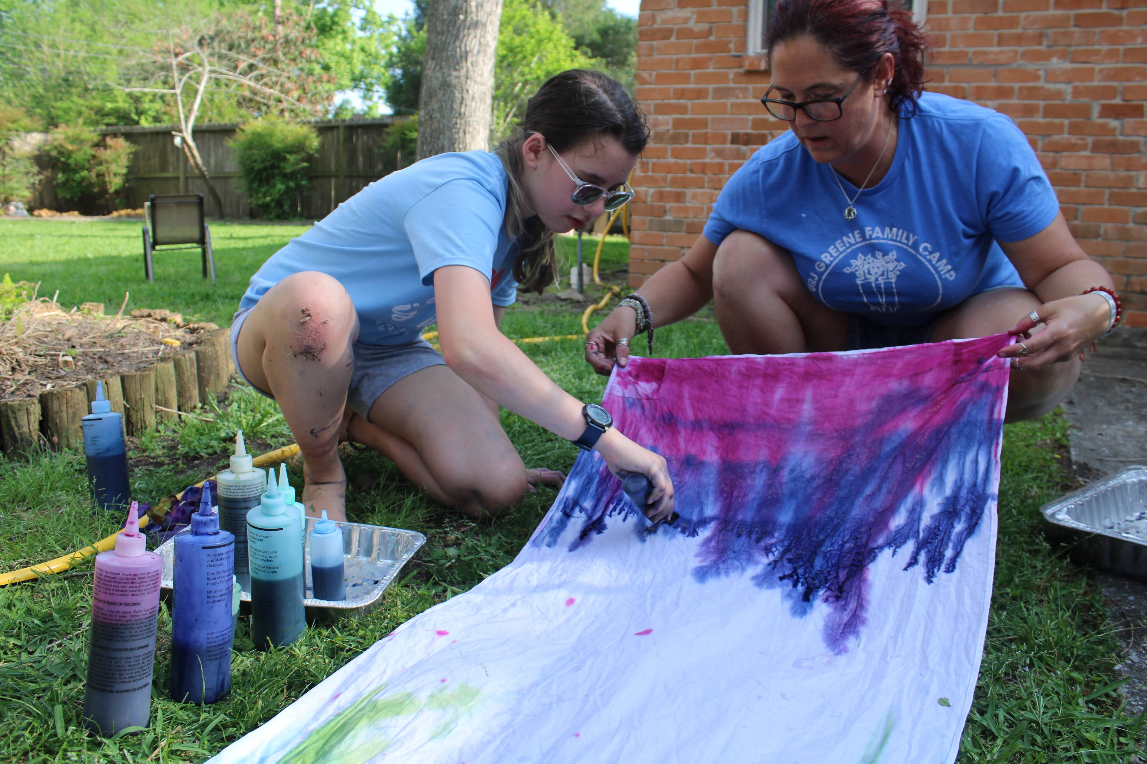 Tie-dye class outdoors with two participants